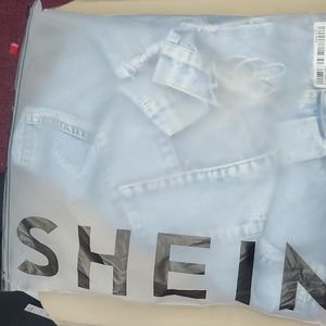 Raw hem fringe detail crop denim jacket new never worn still in package.